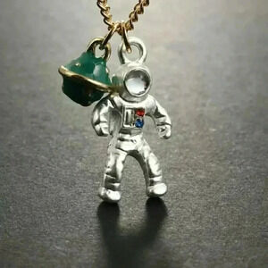 Spaceman astronaut planet earth necklace